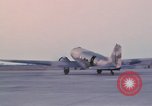 Image of camouflaged AC 47 aircraft Vietnam Bien Hoa Air Base, 1967, second 45 stock footage video 65675052033