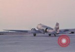 Image of camouflaged AC 47 aircraft Vietnam Bien Hoa Air Base, 1967, second 46 stock footage video 65675052033