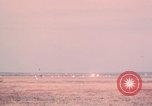 Image of camouflaged AC 47 aircraft Vietnam Bien Hoa Air Base, 1967, second 49 stock footage video 65675052033
