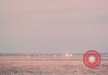 Image of camouflaged AC 47 aircraft Vietnam Bien Hoa Air Base, 1967, second 53 stock footage video 65675052033