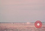 Image of camouflaged AC 47 aircraft Vietnam Bien Hoa Air Base, 1967, second 54 stock footage video 65675052033