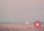 Image of camouflaged AC 47 aircraft Vietnam Bien Hoa Air Base, 1967, second 59 stock footage video 65675052033