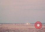 Image of camouflaged AC 47 aircraft Vietnam Bien Hoa Air Base, 1967, second 60 stock footage video 65675052033