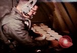 Image of crewman aboard AC 47 aircraft Vietnam Bien Hoa Air Base, 1967, second 8 stock footage video 65675052034