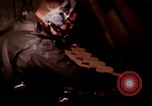 Image of crewman aboard AC 47 aircraft Vietnam Bien Hoa Air Base, 1967, second 9 stock footage video 65675052034