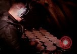 Image of crewman aboard AC 47 aircraft Vietnam Bien Hoa Air Base, 1967, second 10 stock footage video 65675052034