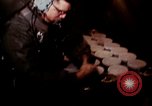 Image of crewman aboard AC 47 aircraft Vietnam Bien Hoa Air Base, 1967, second 13 stock footage video 65675052034