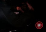 Image of crewman aboard AC 47 aircraft Vietnam Bien Hoa Air Base, 1967, second 24 stock footage video 65675052034