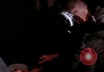 Image of crewman aboard AC 47 aircraft Vietnam Bien Hoa Air Base, 1967, second 31 stock footage video 65675052034