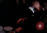 Image of crewman aboard AC 47 aircraft Vietnam Bien Hoa Air Base, 1967, second 33 stock footage video 65675052034