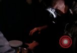 Image of crewman aboard AC 47 aircraft Vietnam Bien Hoa Air Base, 1967, second 34 stock footage video 65675052034