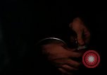 Image of crewman aboard AC 47 aircraft Vietnam Bien Hoa Air Base, 1967, second 43 stock footage video 65675052034