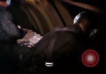 Image of crewman aboard AC 47 aircraft Vietnam Bien Hoa Air Base, 1967, second 60 stock footage video 65675052034