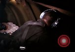 Image of crewman aboard AC 47 aircraft Vietnam Bien Hoa Air Base, 1967, second 62 stock footage video 65675052034