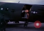 Image of camouflaged AC 47 Vietnam Bien Hoa Air Base, 1967, second 15 stock footage video 65675052035