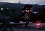 Image of camouflaged AC 47 Vietnam Bien Hoa Air Base, 1967, second 16 stock footage video 65675052035