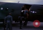 Image of camouflaged AC 47 Vietnam Bien Hoa Air Base, 1967, second 19 stock footage video 65675052035