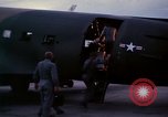 Image of camouflaged AC 47 Vietnam Bien Hoa Air Base, 1967, second 20 stock footage video 65675052035