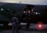 Image of camouflaged AC 47 Vietnam Bien Hoa Air Base, 1967, second 21 stock footage video 65675052035