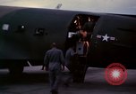 Image of camouflaged AC 47 Vietnam Bien Hoa Air Base, 1967, second 23 stock footage video 65675052035