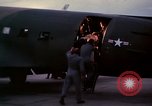 Image of camouflaged AC 47 Vietnam Bien Hoa Air Base, 1967, second 24 stock footage video 65675052035