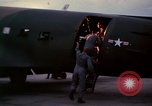 Image of camouflaged AC 47 Vietnam Bien Hoa Air Base, 1967, second 25 stock footage video 65675052035