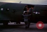 Image of camouflaged AC 47 Vietnam Bien Hoa Air Base, 1967, second 26 stock footage video 65675052035