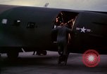 Image of camouflaged AC 47 Vietnam Bien Hoa Air Base, 1967, second 27 stock footage video 65675052035