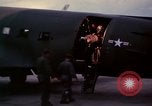 Image of camouflaged AC 47 Vietnam Bien Hoa Air Base, 1967, second 31 stock footage video 65675052035
