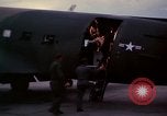 Image of camouflaged AC 47 Vietnam Bien Hoa Air Base, 1967, second 32 stock footage video 65675052035