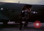 Image of camouflaged AC 47 Vietnam Bien Hoa Air Base, 1967, second 34 stock footage video 65675052035