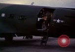 Image of camouflaged AC 47 Vietnam Bien Hoa Air Base, 1967, second 38 stock footage video 65675052035