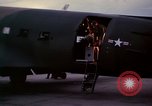 Image of camouflaged AC 47 Vietnam Bien Hoa Air Base, 1967, second 39 stock footage video 65675052035