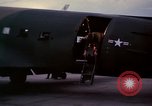 Image of camouflaged AC 47 Vietnam Bien Hoa Air Base, 1967, second 41 stock footage video 65675052035