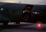 Image of camouflaged AC 47 Vietnam Bien Hoa Air Base, 1967, second 42 stock footage video 65675052035