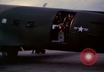 Image of camouflaged AC 47 Vietnam Bien Hoa Air Base, 1967, second 44 stock footage video 65675052035