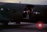 Image of camouflaged AC 47 Vietnam Bien Hoa Air Base, 1967, second 45 stock footage video 65675052035
