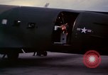Image of camouflaged AC 47 Vietnam Bien Hoa Air Base, 1967, second 46 stock footage video 65675052035