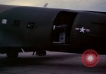 Image of camouflaged AC 47 Vietnam Bien Hoa Air Base, 1967, second 47 stock footage video 65675052035