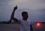 Image of camouflaged AC 47 Vietnam Bien Hoa Air Base, 1967, second 49 stock footage video 65675052035