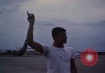 Image of camouflaged AC 47 Vietnam Bien Hoa Air Base, 1967, second 50 stock footage video 65675052035