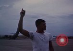 Image of camouflaged AC 47 Vietnam Bien Hoa Air Base, 1967, second 51 stock footage video 65675052035