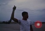 Image of camouflaged AC 47 Vietnam Bien Hoa Air Base, 1967, second 52 stock footage video 65675052035