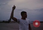 Image of camouflaged AC 47 Vietnam Bien Hoa Air Base, 1967, second 55 stock footage video 65675052035