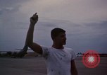 Image of camouflaged AC 47 Vietnam Bien Hoa Air Base, 1967, second 57 stock footage video 65675052035