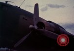Image of camouflaged AC 47 Vietnam Bien Hoa Air Base, 1967, second 60 stock footage video 65675052035