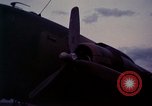 Image of camouflaged AC 47 Vietnam Bien Hoa Air Base, 1967, second 61 stock footage video 65675052035