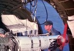 Image of AC 47 crewmen Vietnam Bien Hoa Air Base, 1967, second 13 stock footage video 65675052036