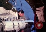 Image of AC 47 crewmen Vietnam Bien Hoa Air Base, 1967, second 17 stock footage video 65675052036