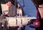 Image of AC 47 crewmen Vietnam Bien Hoa Air Base, 1967, second 28 stock footage video 65675052036